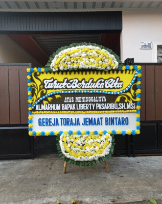 Papan Bunga Duka di Sengkol